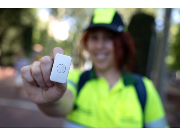 A picture taken on July 6, 2026 in Barcelona shows a gardener's wristband containing a sensor that detects body temperature. (Photo by Josep Lago / AFP)