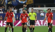 Egypt's defender #05 Ramy Rabia, forward #10 Mohamed Salah and defender #03 Mohamed Hany react during the 2026 World Cup round of 16 football match between Argentina and Egypt at Atlanta Stadium in Atlanta on July 7, 2026. (Photo by Odd Andersen / AFP)