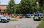 Cars by Police and rescue personnel are parked near the secondary school Schongau, in the southern German state of Bavaria, where several people have been wounded and a suspect arrested in an attack on July 8, 2026.  (Photo by Christoph PETERS / DPA / AFP)