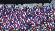 France fans cheer for their team during the 2026 World Cup football tournament quarter-final at Boston Stadium in Foxborough on July 9, 2026. (Photo by Charly Triballeau / AFP)