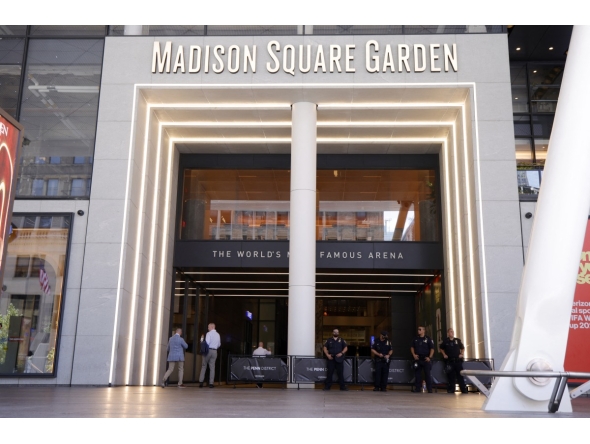 Police officers stand guard outside Madison Square Garden in New York on July 3, 2026. Photo by Leonardo Munoz / AFP