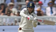 India's Smriti Mandhana hits a boundary on the first day of the first Women's cricket Test match between England and India at Lord's cricket ground in London, on July 10, 2026. (Photo by Justin Tallis / AFP)