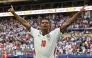 England's midfielder #10 Jude Bellingham celebrates after scoring his team's second goal during the 2026 World Cup football tournament quarter-final match between Norway and England at Miami Stadium in Miami on July 11, 2026. (Photo by ROBERTO SCHMIDT / AFP)