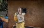 A medical worker performs disinfection before burying a deceased person infected with the Ebola virus in Bunia, the capital of Ituri Province in the Democratic Republic of the Congo, July 9, 2026. (Xinhua)