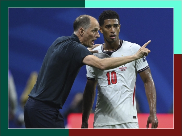 England coach Thomas Tuchel speaks with Jude Bellingham during the semi-final against Argentina. 