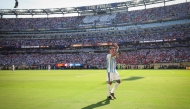 Argentina's midfielder #24 Enzo Fernandez applauds the fans as he leaves the pitch after being shown a red card on July 19, 2026. (Photo by Charly Triballeau / AFP)