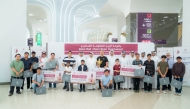 Officials with all the winners of the fourth Chess Open.