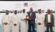 The ministry’s delegation receiving a memento during the event.