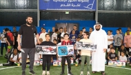 Officials with winners during the ceremony.