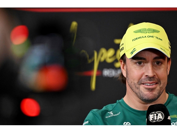 Aston Martin's Spanish driver Fernando Alonso addresses the press conference ahead of the Formula One Hungarian Grand Prix at the Hungaroring circuit in Mogyorod near Budapest, Hungary, on July 23, 2026. (Photo by Attila KISBENEDEK / AFP)