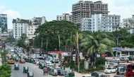 Vehicles wait in a queue to refuel with compressed natural gas (CNG) at a filling station in Dhaka on July 26, 2026. (Photo by MUNIR UZ ZAMAN / AFP)
