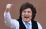(FILES) Argentina's President Javier Milei gestures from the balcony of Casa Rosada presidential palace after a Te Deum marking the 216th anniversary of the May Revolution that led to Argentina's independence from Spain, in Buenos Aires on May 25, 2026. (Photo by Luis ROBAYO / AFP)