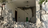 This photograph shows a house damaged following a 4.7 magnitude earthquake in Pozzuoli, near Naples on August 1, 2026. (Photo by Cesare ABBATE / ANSA / AFP) 
