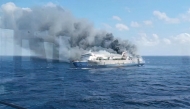 This screen grab from a handout video taken and released on August 2, 2026, by Indonesia's National Search and Rescue Agency (Basarnas), shows the passenger ship Mutiara Sentosa 2 catching fire in the waters off Madura island, East Java. Photo by Handout / INDONESIA'S NATIONAL SEARCH AND RESCUE AGENCY (BASARNAS) / AFP