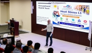 An official speaking during an awareness and training workshop.