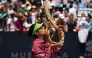 Alexandra Eala of the Philippines kisses the Championship Trophy after winning the women's singles championship match against Jessica Pegula of the United States on the final day of the Mubadala DC Open 2026 at William H.G. FitzGerald Tennis Center on August 3, 2026 in Washington, DC. Scott Taetsch/Getty Images/AFP 