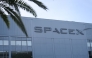 The SpaceX logo is displayed outside a Space Exploration Technologies Corp. facility in Hawthorne, California, on June 8, 2026. Photo by Patrick T. Fallon / AFP