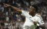(FILES) Real Madrid's Brazilian forward #07 Vinicius Junior celebrates scoring his team's first goal during the UEFA Champions League quarter final second leg football match between Real Madrid CF and Arsenal at Santiago Bernabeu Stadium in Madrid on April 16, 2025. (Photo by Pierre-Philippe MARCOU / AFP)
