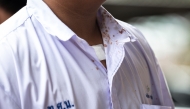 Blood stains are seen on a student's shirt collar following a school shooting in Bang Kruai district, Nonthaburi province, north of Thailand's capital Bangkok, on August 7, 2026. Photo by CHANAKARN LAOSARAKHAM / AFP