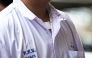 Blood stains are seen on a student's shirt collar following a school shooting in Bang Kruai district, Nonthaburi province, north of Thailand's capital Bangkok, on August 7, 2026. Photo by CHANAKARN LAOSARAKHAM / AFP