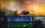 This photograph shows a fire in construction waste at a recycling company near the port of Rotterdam, in Rotterdam on August 7, 2026. (Photo by Jeffrey Groeneweg / ANP / AFP)
 