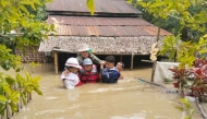 Rescuers evacuate residents in Laymyethna township in Ayeyarwady region, Myanmar, Aug. 1, 2026. (Myanmar Fire Services Department/Handout via Xinhua)