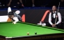Ding Junhui (L) of China competes during the round 1 match between Ding Junhui of China and David Gilbert of England at China Open 2026 snooker tournament in Taiyuan, north China's Shanxi Province, Aug. 8, 2026. (Xinhua/Cao Yang)