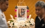 A portrait of 12-year-old school shooting victim Naphat Chaima is displayed in front of the coffin during her funeral at the Wat Lat Pla Duk Buddhist temple in Nonthaburi province, north of Thailand's capital Bangkok, on August 9, 2026. Photo by Chanakarn LAOSARAKHAM / AFP