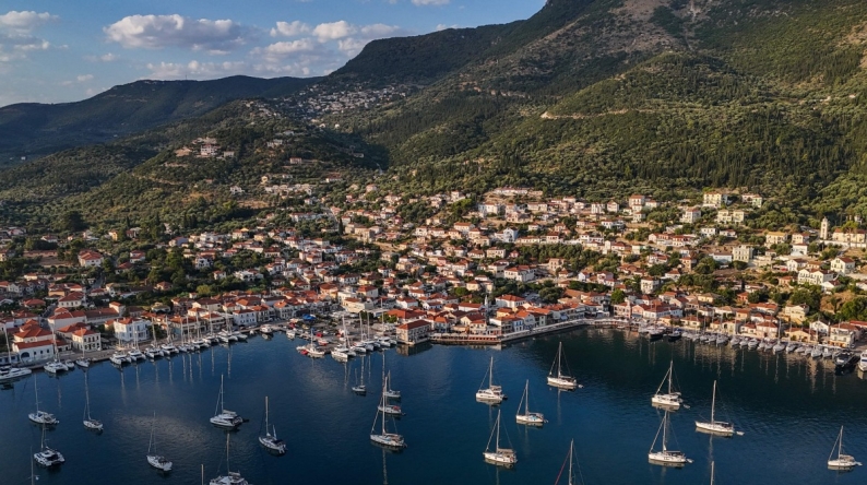This photo taken on August 4, 2026, shows an aerial view of the town of Vathy on the island of Ithaca. Photo by Angelos TZORTZINIS / AFP