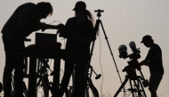 Researchers from San Francisco's Exploratorium museum carry out preparations for the global live broadcast of the upcoming August 12 total solar eclipse, in the abandoned village of Villalibado, near Burgos, northern Spain, on August 10, 2026. Photo by CESAR MANSO / AFP
