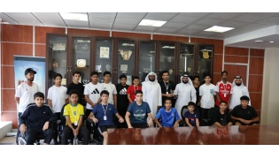 Officials with a group of students who participated in an awareness session.
