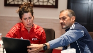 Dr. Jessica Miranda with AFC and QFA Referees Committees chairman Hani Taleb Ballan.