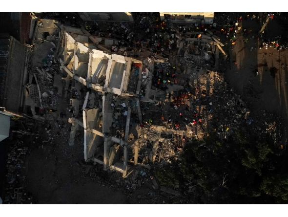 This aerial view shows the rubble of a collapsed building in Cali, Colombia, on August 13, 2026, three days after a 7.4-magnitude earthquake. Photo by Raul ARBOLEDA / AFP
