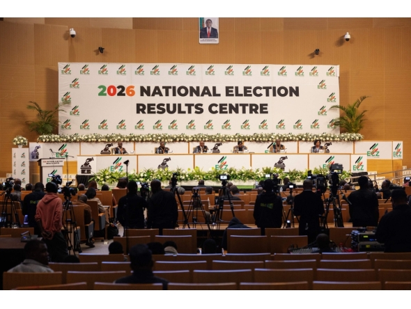 Electoral Commission of Zambia chairperson Mwangala Zaloumis (back row 3rd R) addresses the nation at the 2026 National Election Results Centre in Lusaka on August 14, 2026. Zambia resumed vote counting on August 14 after a nationwide suspension over violence raised tensions nationwide. (Photo by GIANLUIGI GUERCIA / AFP)