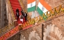 India's Prime Minister Narendra Modi (C, front) leaves after addressing the nation from the ramparts of the Red Fort during the celebrations to mark the country's Independence Day in New Delhi on August 15, 2026. (Photo by Sajjad HUSSAIN / AFP)
