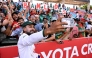 Bangladesh player Mehidy Hasan Miraz poses with fans after victory against Australia on the fourth day of the first cricket Test match between Australia and Bangladesh at Marrara Stadium in Darwin on August 16, 2026. (Photo by William WEST / AFP)
