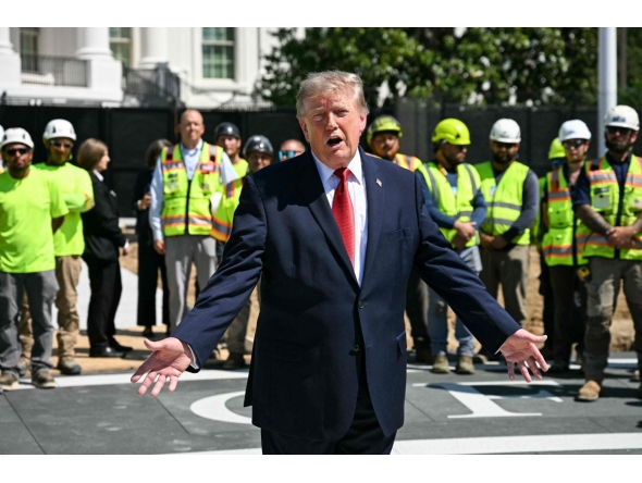 US President Donald Trump speaks to the press at the construction site of a helipad on the South Lawn of the White House in Washington, DC, on August 19, 2026. (Photo by Jim WATSON / AFP)
