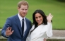(FILES) Britain's Prince Harry and Meghan Markle pose for a photograph in the Sunken Garden at Kensington Palace in west London on November 27, 2017, following the announcement of their engagement. (Photo by Daniel LEAL / AFP)
