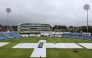 The covers stay on the pitch as rain delays the start of day two of the first Test match between England and Pakistan at Headingley cricket ground in Leeds, northern England on August 20, 2026. (Photo by Darren Staples / AFP) 