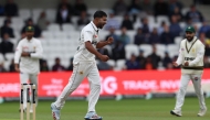 Pakistan's Khurram Shahzad celebrates taking the wicket England's Joe Root on day two of the first Test match between England and Pakistan at Headingley cricket ground in Leeds, northern England on August 20, 2026. (Photo by Darren Staples / AFP)