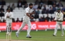 Pakistan's Khurram Shahzad celebrates taking the wicket England's Joe Root on day two of the first Test match between England and Pakistan at Headingley cricket ground in Leeds, northern England on August 20, 2026. (Photo by Darren Staples / AFP)