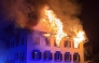 This handout photograph taken and released on August 21, 2026 by the Cantonal Police of Graubunden (Kantonspolizei Graubunden) shows a fire that broke out in a building in the small town of Thusis, eastern Switzerland. Photo by Handout / Kantonspolizei Graubünden / AFP