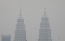 Petronas twin towers shrouded by haze in Kuala Lumpur. Reuters file photo.