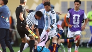 :(FILES) Argentina's midfielder #05 Leandro Paredes (top) clashes with Spain's midfielder #09 Gavi during the 2026 World Cup football tournament final match between Spain and Argentina at the New York/New Jersey Stadium in East Rutherford on July 19, 2026. (Photo by CHARLY TRIBALLEAU / AFP)