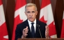 Canadian Prime Minister Mark Crney speaks at a press conference in Ottawa, Ontario, on August 22, 2026 after trade talks with the US collapsed. Photo by Dave Chan / AFP