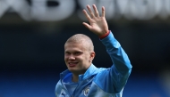 Manchester City's Norwegian striker #09 Erling Haaland, sporting a new hair cut, warms up ahead of the English Premier League football match between Manchester City and AFC Bournemouth at the Etihad Stadium in Manchester, north west England, on August 23, 2026. (Photo by Darren Staples / AFP)