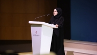 Director of the Scholarships Department Noura Mohammed Al Ansari speaking at the event.