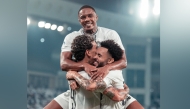 Al Sadd players celebrate during their match against Al Ahli on Saturday.