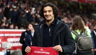 Lille's French midfielder #32 Ayyoub Bouaddi poses for a photograph with a jersey reading 