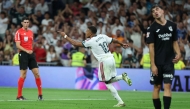 Real Madrid's French forward #10 Kylian Mbappe celebrates scoring his team's first goal during the Spanish league football match between Real Madrid CF and Real Sociedad at Santiago Bernabeu Stadium in Madrid on August 26, 2026. (Photo by Thomas COEX / AFP)
